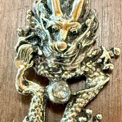 Xiu Jiao Silver Tone Dragon Pendant -