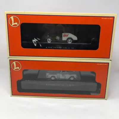 Pair of Lionel Flat Rail Cars With Onboard Trucks