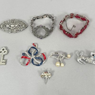 Collection of Assorted Costume Jewelry Including Brooches and Bracelets