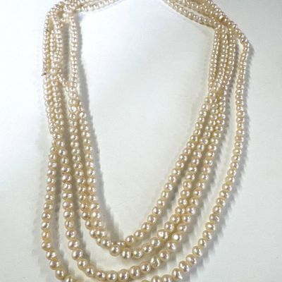 Multi-strand Pearl Necklace with Gucci Pouch