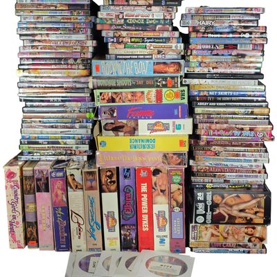 Sale Photo Thumbnail #334: An Assortment of Adult Erotica DVDs and VHS Tapes from Various Studios