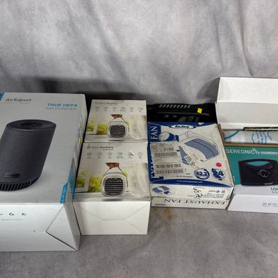 Sale Photo Thumbnail #660: A Collection of Contemporary Small Appliances and Electronics including AirExpect, National Geographic, and Blast Auxiliary