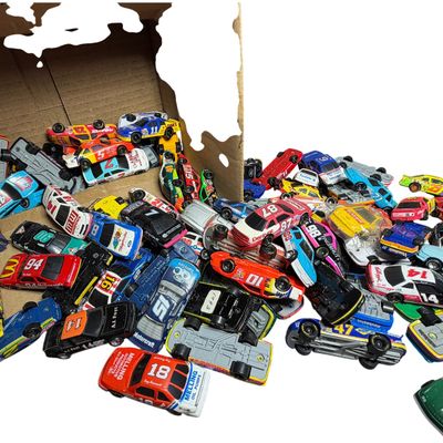 Sale Photo Thumbnail #270: A Collection of Racing Champions and Tomica Die-Cast Model Racing Cars