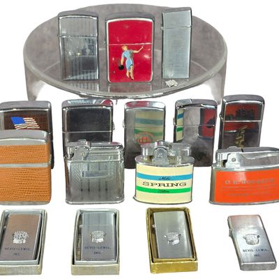 Sale Photo Thumbnail #150: A Collection of Vintage Advertising and Fraternal Pocket Lighters Including Zippo, Barlow, and Storm King