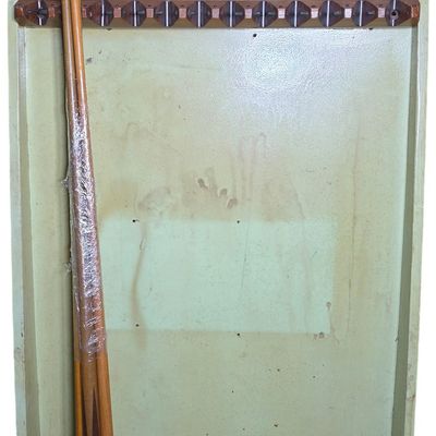 Sale Photo Thumbnail #859: A Vintage Brunswick Metal Wall Mounted Pool Cue Rack and Wood Cues
