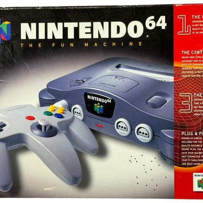 Sale Photo Thumbnail #700: Nintendo 64 The Fun Machine Video Game Console Set in Original Box with Expansion Pak