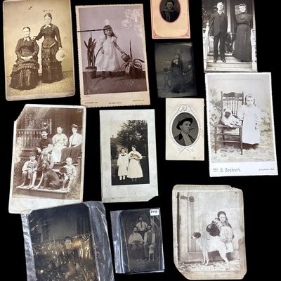Sale Photo Thumbnail #744: A Collection of Antique Photographs Depicting Families and Domestic Pets Including Dogs and One Cat