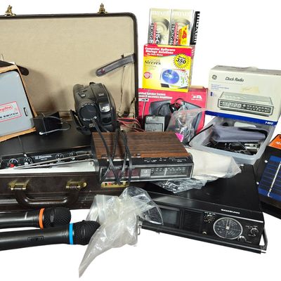 Sale Photo Thumbnail #586: An Assortment of Vintage Plastic and Metal Electronics with a Hard-Sided Briefcase