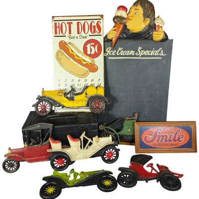 Sale Photo Thumbnail #628: Six Vintage Style Advertising Signs and Decorative Wall Plaques with a Storage Case