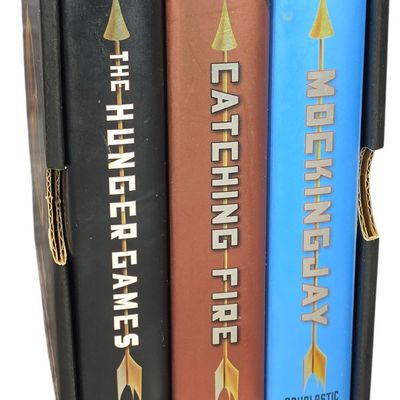 Sale Photo Thumbnail #319: Collins, Suzanne. The Hunger Games Trilogy (Boxed Set). Scholastic Press, 2008-2010. First Edition, Later Printings (DJ)