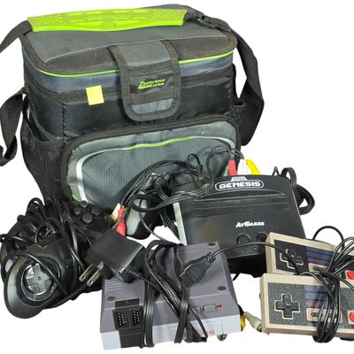 Sale Photo Thumbnail #495: A Group of Retro Style Plastic Gaming Consoles and Accessories