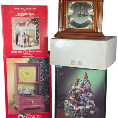 Sale Photo Thumbnail #595: Four Bulova and Mr. Christmas Clocks with Holiday Ceramic and Resin Decorations