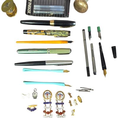 Sale Photo Thumbnail #216: A Collection of Vintage Fountain Pens, Religious Service Medals, and a Military Themed Compact
