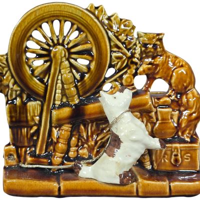 Sale Photo Thumbnail #384: McCoy Pottery Spinning Wheel Dog and Cat Ceramic Planter