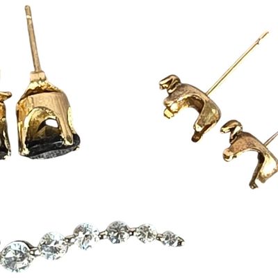 Sale Photo Thumbnail #218: A Collection of 10 Karat Gold and White Metal Jewelry Including Black Gemstone Studs and a Seven Stone Climber