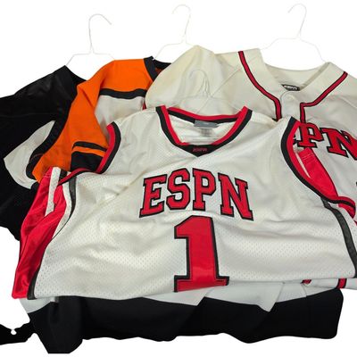 Sale Photo Thumbnail #338: A Group of Four ESPN, Serenity Promotional, and Charles Woodson Puma Sports Jerseys