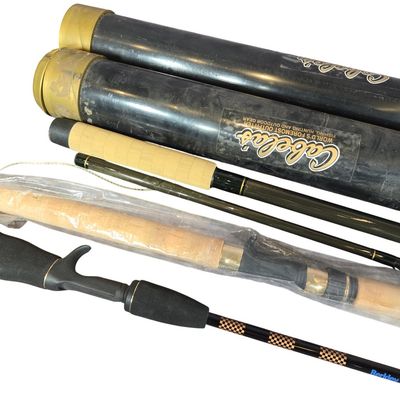 Sale Photo Thumbnail #594: An Assortment of Cabela's and Berkley Graphite Fishing Rods and Storage Tubes