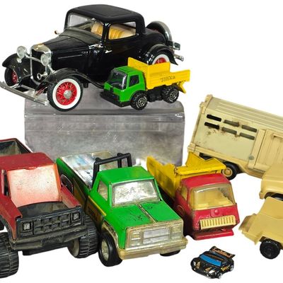 Sale Photo Thumbnail #503: Ten Vintage Pressed Steel and Die-Cast Toy Vehicles