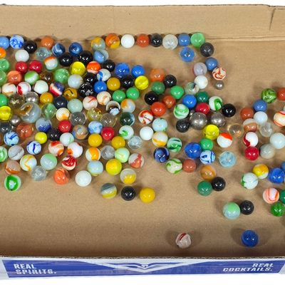 Sale Photo Thumbnail #478: An Assortment of Vintage Machine-Made Glass Marbles Including Uranium Glass and Metallic Steelies