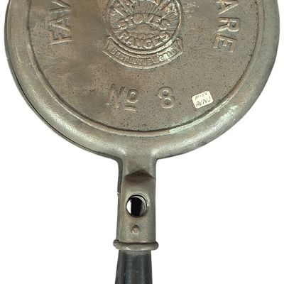 Sale Photo Thumbnail #403: A Pair of Favorite Piqua Ware No. 8 Cast Iron Waffle Iron Paddles