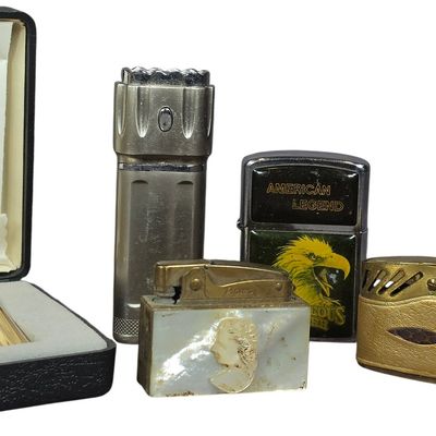 Sale Photo Thumbnail #491: Five Vintage and Contemporary Metal Cigarette Lighters