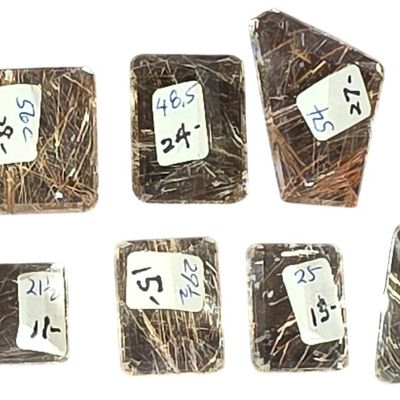 Sale Photo Thumbnail #424: A Set of 15 Loose Faceted Rutilated Quartz Gemstones