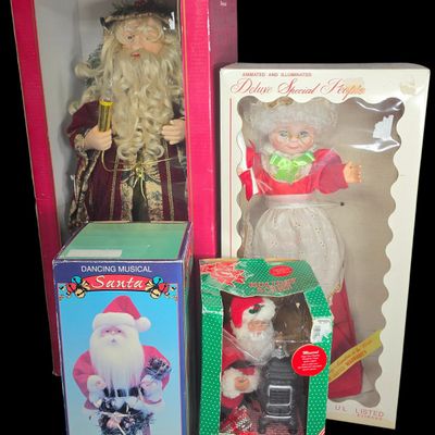 Sale Photo Thumbnail #794: A Collection of Four Vintage Animated and Illuminated Christmas Display Figures including Design Arts and Holiday Creations