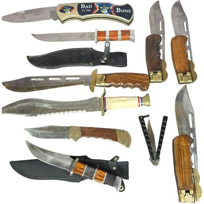 Sale Photo Thumbnail #135: A Collection of Eleven Large Fixed Blade and Folding Collectible Knives Including Tomahawk and Mountaineer Examples