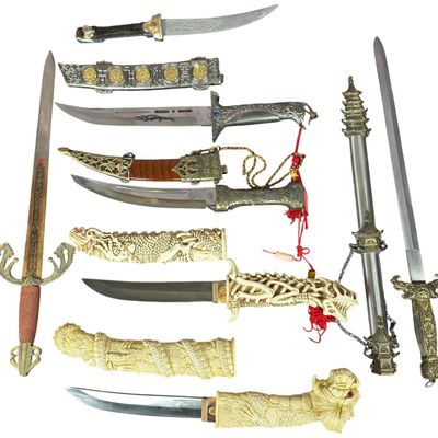 Sale Photo Thumbnail #130: Collection of Contemporary Ornate and Dragon Themed Decorative Swords and Daggers