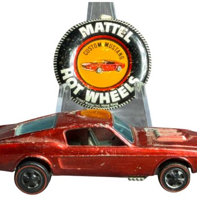 Sale Photo Thumbnail #262: A Mattel Hot Wheels Custom Mustang Redline Toy Car and Collector Button