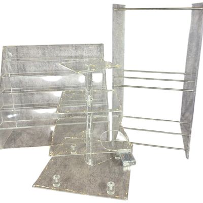 Sale Photo Thumbnail #815: An Assortment of Clear Acrylic Retail and Collection Display Stands