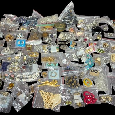 Sale Photo Thumbnail #100: A Large Collection of Vintage Signed and Unsigned Costume Jewelry Including Trifari, Weiss, and Kramer