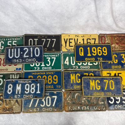 Sale Photo Thumbnail #665: An Assortment of 20 Vintage United States License Plates Including Ohio, New Jersey, and West Virginia Examples