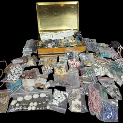 Sale Photo Thumbnail #103: An Assortment of Vintage Costume Jewelry with Storage Tin