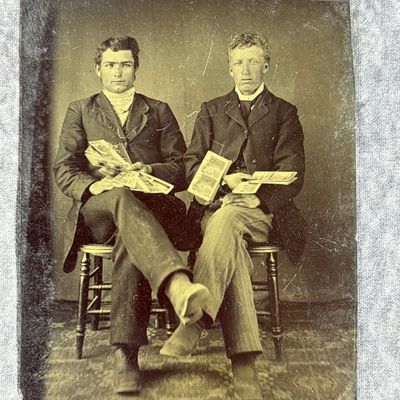 Sale Photo Thumbnail #743: Two Young Men Seated Holding Stereoview Photos and Fans of Currency Sixth Plate Tintype