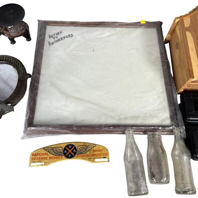 Sale Photo Thumbnail #659: A Collection of World War II Era Memorabilia, Decorative Elephant Accents, and Shadowhawk Tactical Flashlight Kits