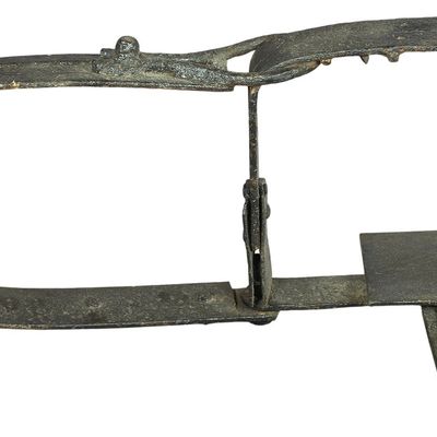 Sale Photo Thumbnail #788: Antique Forged Iron Body Grip Animal Trap with Spiked Jaws