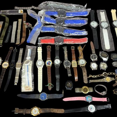 Sale Photo Thumbnail #99: A Collection of Vintage and Contemporary Wristwatches, Heads, and Bands Including Casio, Swiss Army, and Disney