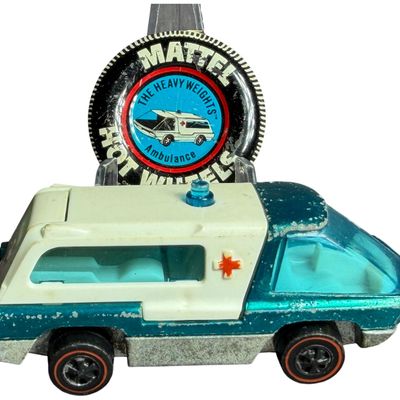 Sale Photo Thumbnail #264: Hot Wheels The Heavyweights Redline Ambulance and Matching Collector Button