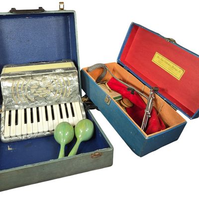 Sale Photo Thumbnail #560: An Assortment of Vintage Musical Instruments and Accessories featuring a Cantarini Accordion