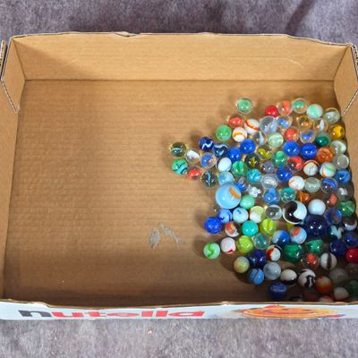Sale Photo Thumbnail #449: A Collection of Vintage Glass Marbles Including Uranium Glass