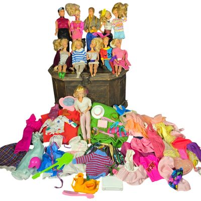 Sale Photo Thumbnail #288: An Assortment of Mattel Fashion Dolls and Accessories with a Faux-Wood Storage Trunk