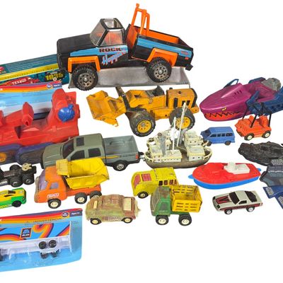Sale Photo Thumbnail #809: A Collection of Vintage and Modern Toy Vehicles Including Tonka, Ertl, and Buddy L