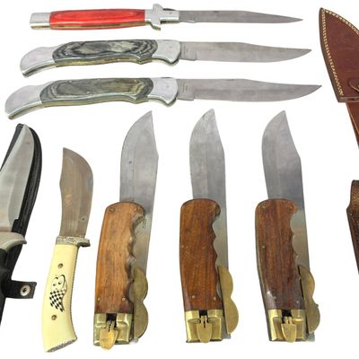 Sale Photo Thumbnail #127: A Collection of Eight Oversized Folding and Fixed Blade Knives from Pakistan and China