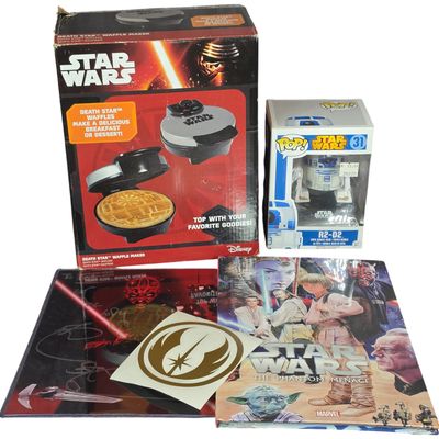 Sale Photo Thumbnail #331: A Group of Star Wars Themed Collectibles Including a Death Star Waffle Maker and Autographed Photograph