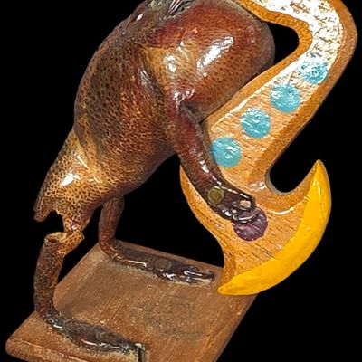 Sale Photo Thumbnail #799: A Vintage Lacquered Taxidermy Frog Musician Playing Saxophone