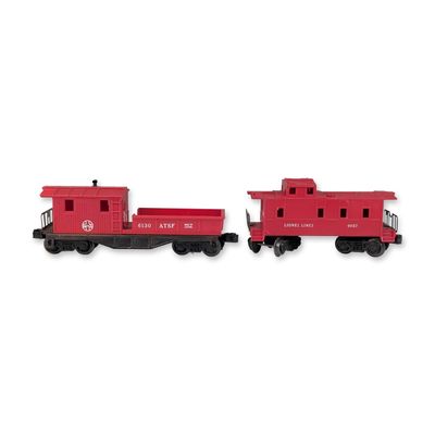 Two Lionel Lines O-Gauge Plastic Cabooses- 6057, 6130