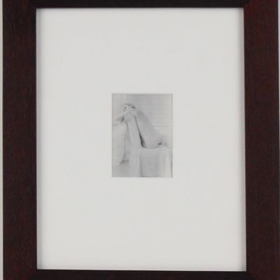 Lynn Bianchi, American 1944-, Seated Woman with Mirror, Silver Gelatin Print Bathed in Gold