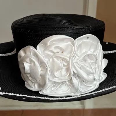 Sale Photo Thumbnail #51: Black wide-brimmed church hat with white satin rose appliqué