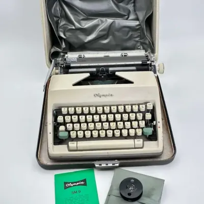 Vintage Olympia SM 9 De Luxe Portable Typewriter with Case and Manual